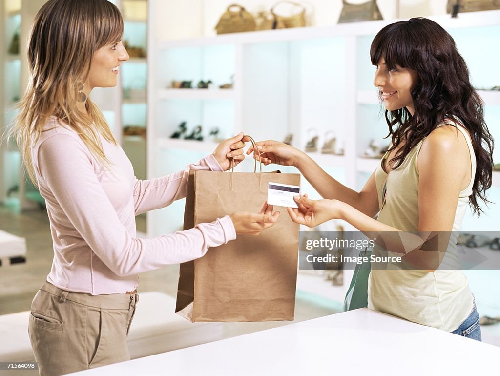 Woman and sales assistant