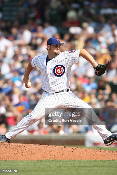 Scott Williamson of the Chicago Cubs pitches during the game against the New York Mets at Wrigley Field in Chicago, Illinois on July 14, 2006. The...