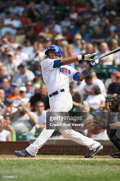 Derrek Lee of the Chicago Cubs bats during the game against the New York Mets at Wrigley Field in Chicago, Illinois on July 14, 2006. The Mets...
