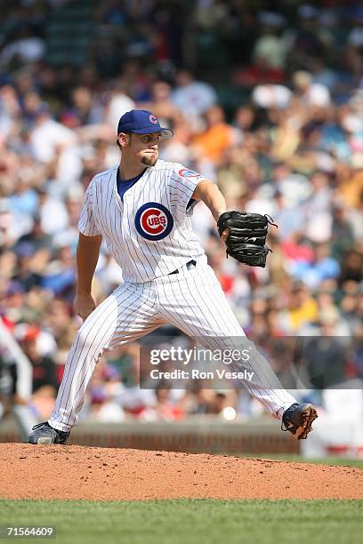 Scott Williamson of the Chicago Cubs pitches during the game against the New York Mets at Wrigley Field in Chicago, Illinois on July 14, 2006. The...