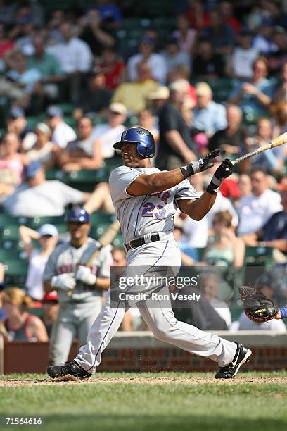 Julio Franco of the New York Mets bats during the game against the Chicago Cubs at Wrigley Field in Chicago, Illinois on July 14, 2006. The Mets...