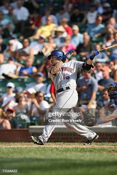 Paul Lo Duca of the New York Mets bats during the game against the Chicago Cubs at Wrigley Field in Chicago, Illinois on July 14, 2006. The Mets...