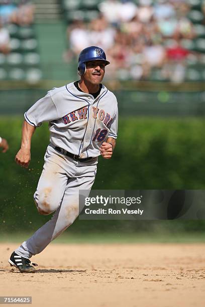 Jose Valentin of the New York Mets runs during the game against the Chicago Cubs at Wrigley Field in Chicago, Illinois on July 14, 2006. The Mets...