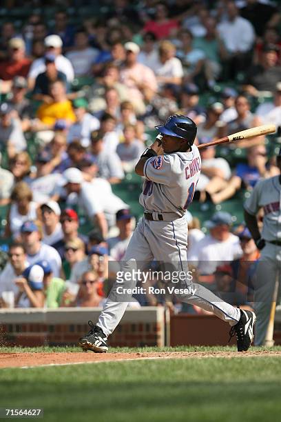 Endy Chavez of the New York Mets bats during the game against the Chicago Cubs at Wrigley Field in Chicago, Illinois on July 14, 2006. The Mets...