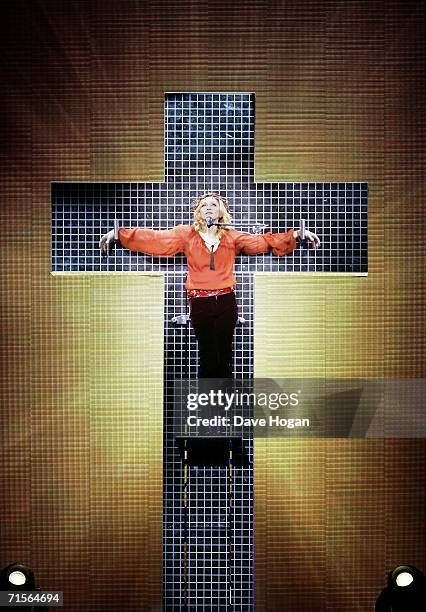 Madonna performs onstage at the first London concert of her "Confessions" World Tour at Wembley Arena August 1, 2006 in London, England.