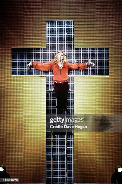 Madonna performs onstage at the first London concert of her "Confessions" World Tour at Wembley Arena August 1, 2006 in London, England.