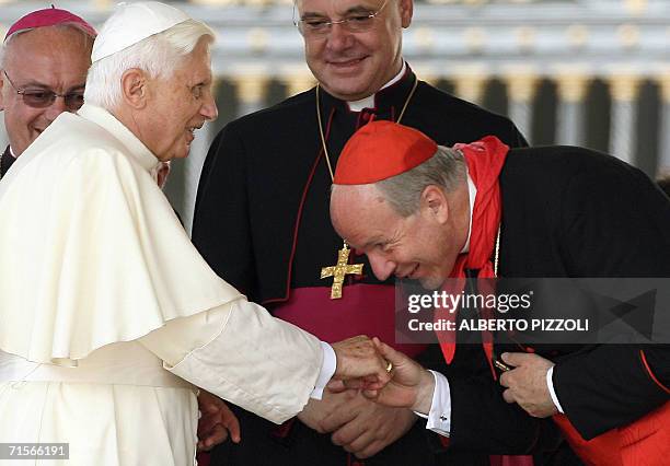 Vatican City, VATICAN CITY STATE: Pope Benedict XVI is greeted by Archbishop of Vienna Cardinal Christoph Schoenborn during his open-air weekly...