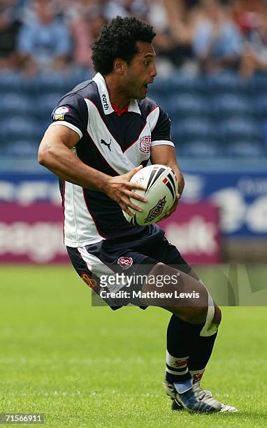 Francis Meli of St.Helens runs with the ball during the Powergen Challenge Cup Semi Final match between Hull KR and St. Helens at the Galpharm...
