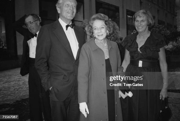 American politician John Vliet Lindsay stands with socialite Brooke Astor and his wife Mary at the opening of three new restaurants at Rockefeller...