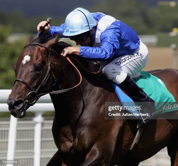 Jimmy Fortune and Court Masterpiece lead the field home to land The Cantor Spreadfair Sussex Stakes Race run at Goodwood Racecourse on August 2 in...