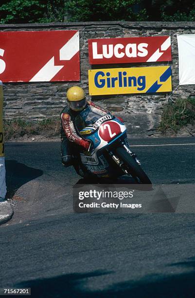 Irish racing motorcyclist Joey Dunlop takes a corner on a Honda in the Formula One event at the Isle of Man TT races, 1978.