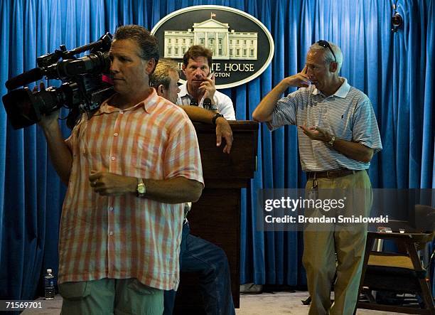 Crew rests on the podium in the press room of the White House August 2, 2006 in Washington, DC. White House press corps will leave their facilities...