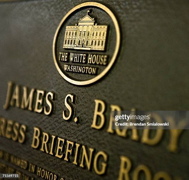 Plaque hangs in the White House press room dedicated to former Ronald Reagan Press Secretary James Brady August 2, 2006 in Washington, DC. White...