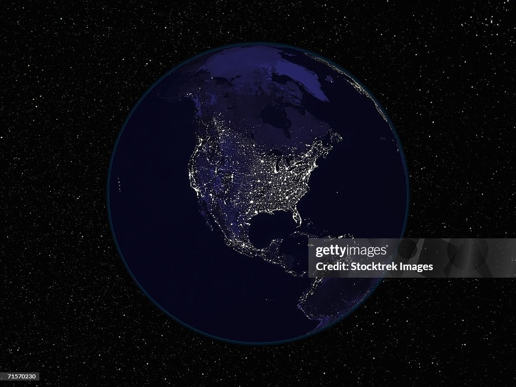 Fully dark image of Earth at night centered on North America showing city lights.