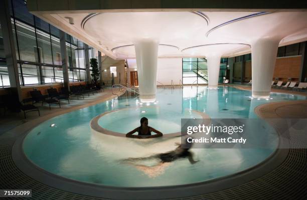 Two bathers enjoy the facilities in the Minerva pool inside the Thermal Bath Spa complex as it prepares to open to the public on August 2, 2006 in...