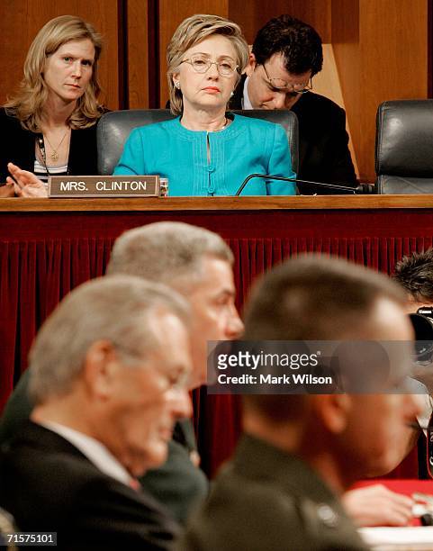 Sen. Hillary Clinton watches as Secretary of Defense Donald Rumsfeld, General John Abizaid and Chairman of the Joint Chiefs of Staff Gen. Peter Pace...