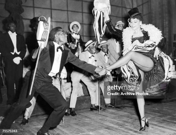 American dancer and choreographer Katherine Dunham and Ranoye Aikens rehearsing for Dunham's new show at the Cambridge Theatre, 10th January 1952.