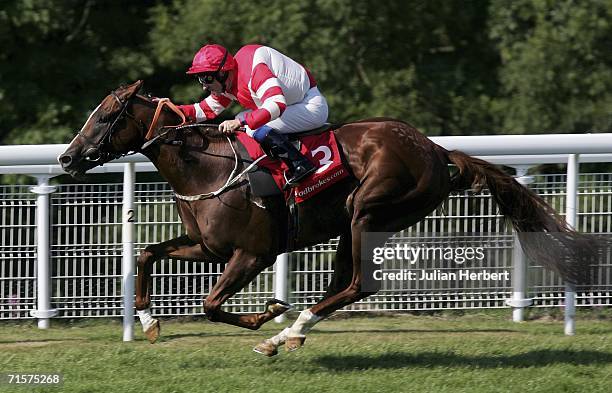 Richard Hills and Road To Love score an easy victory in The ladbrokes.com Stakes Race run at Goodwood Racecourse on August 3 in Goodwood, England....