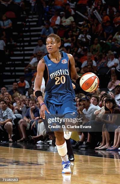 Alana Beard of the Washington Mystics moves the ball up court during a game against the San Antonio Silver Stars at AT&T Center on July 21, 2006 in...