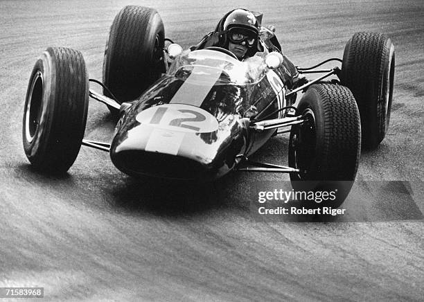 Scottish racing car driver Jimmy Clark negotiates a turn during the Grand Prix de Monaco, May 10, 1964.