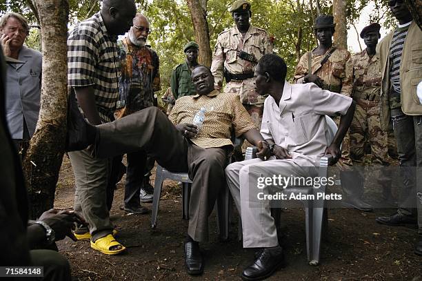 Vincent Otti , second in charge of the Lords Resistance Army speaks with Dr Riek Machar, vice president of Southern Sudan chat during peace talks on...