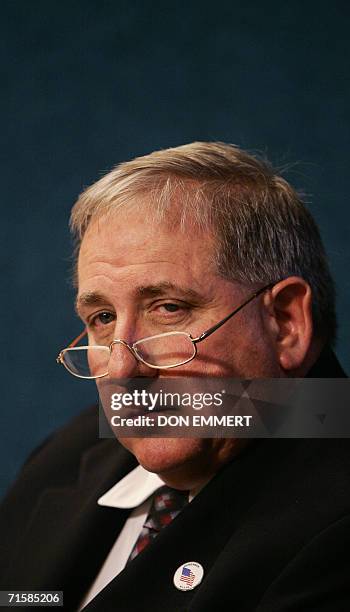 New York, UNITED STATES: Bruce DeCell, board member of the WTC United Family Group Board, listens to questions during a press briefing by leaders of...