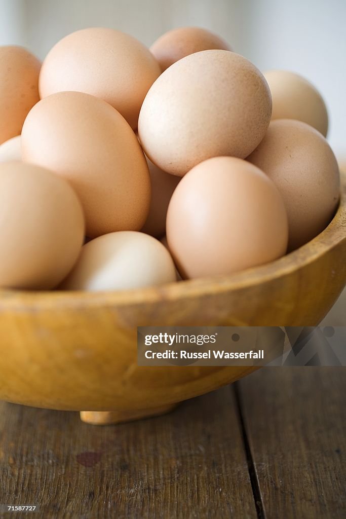 Extra Large Free-range Eggs in a Wooden Bowl