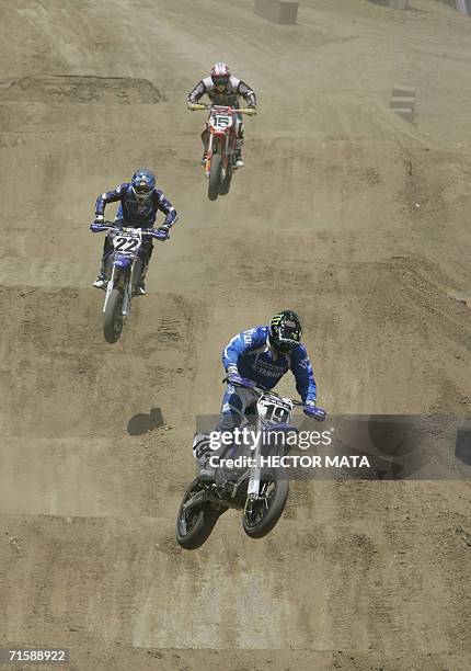 Los Angeles, UNITED STATES: Competitors for the Moto Freestyle event practice at the Home Depot Center during the X Games 12 in LOs Angeles, CA 04...