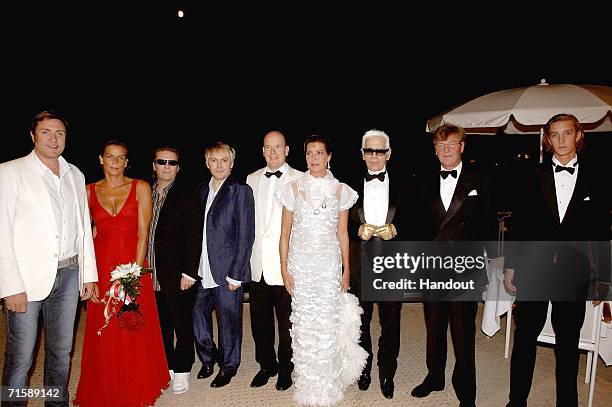 In this handout photo from SBM, singer Simon Le Bon of Duran Duran, Princess Stephanie of Monaco, musicians Andy Taylor and Nick Rhodes of Duran...