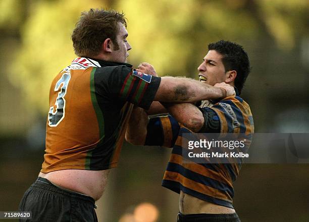Nick Barber of Penrith and Joey Philippe of Sydney University exchange heated words during the Tooheys New Cup Rd 10 match between Sydney University...