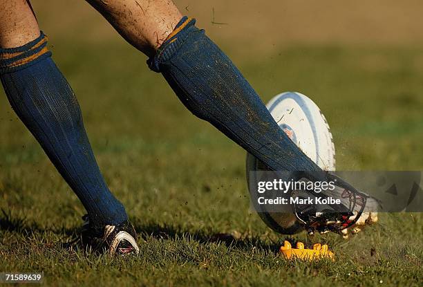 General view of football being kicked off a tee during the Tooheys New Cup Rd 10 match between Sydney University and Penrith at Sydney University...