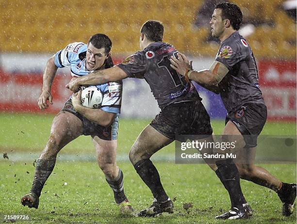 Paul Gallen of the Sharks runs with the ball during the round 22 NRL match between the Warriors and the Cronulla-Sutherland Sharks at Ericsson...