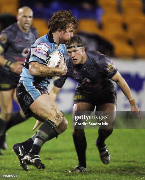 Lance Thompson of the Sharks in action during the round 22 NRL match between the Warriors and the Cronulla-Sutherland Sharks at Ericsson Stadium on...