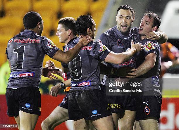 The Warriors celebrate a try during the round 22 NRL match between the Warriors and the Cronulla-Sutherland Sharks at Ericsson Stadium on August 5,...