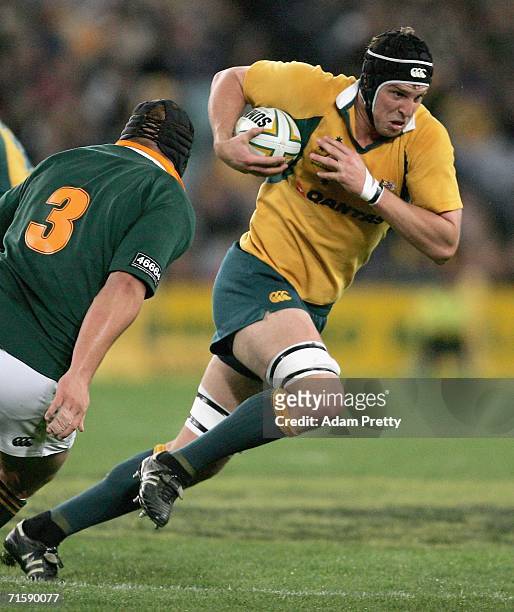 Daniel Vickerman of the Wallabies runs during the Tri Nations series second Mandela plate match between Australia and South Africa at Telstra Stadium...