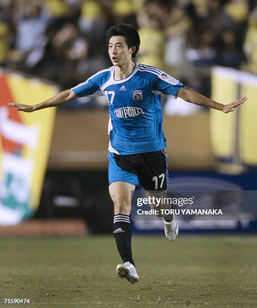 China's Dalian Shide FC forward Zou Jie celebrates his goal against Japanese club JEF United Chiba during their match of the A3 Champions Cup 2006 in...