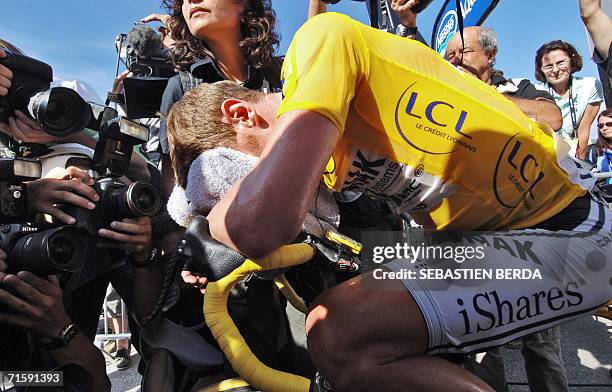 - File picture taken 19 July 2006 of USA's Floyd Landis reacting after losing his yellow jersey of overall leader at the end of the 182 km sixteenth...