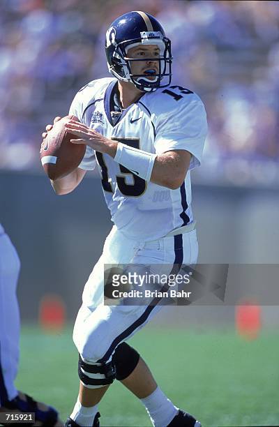 Quarterback Bret Engemann of the Brigham Young University Cougars starts to pass the ball during the game against the Air Force Academy Falcons at...