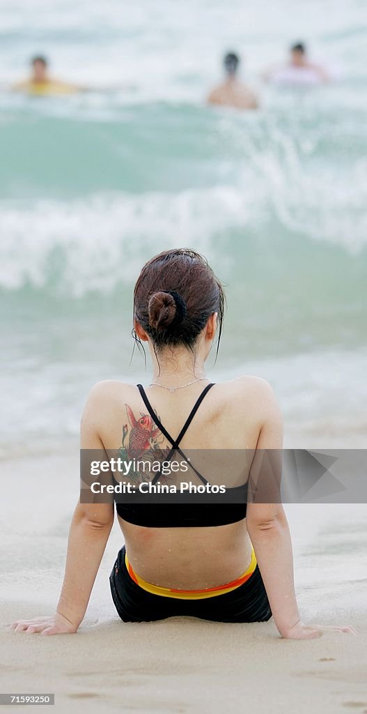 Shenzhen Bathing Beach Thronged With Swimmers