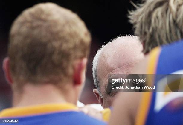 Leigh Matthews of the Lions in action during the round 18 AFL match between the Brisbane Lions and Geelong at the Gabba on August 6, 2006 in...