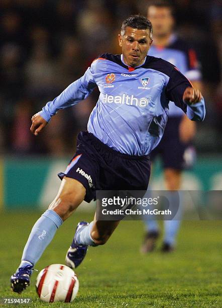 Steve Corica of Sydney runs with the ball during the Hyundai A-League Preseason Cup round four match between Sydney FC and Perth Glory held at Win...