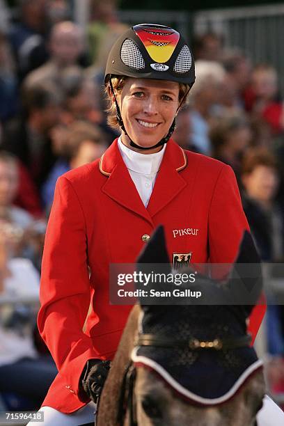 German national equestrian team member Meredith Michaels performs in front of the Brandenburg Gate at a promotional event for the World Equestrian...