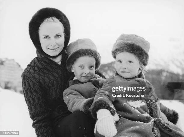 Eliette von Karajan, the wife of Austrian conductor Herbert von Karajan, holidays in St Moritz with their two daughters Arabelle and Isabelle , 1966.