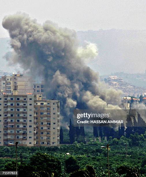 An Israeli air strike hits the area of al-Hosh, north of Tyre 07 August 2006. The southern port city was completely cut off from the rest of the...