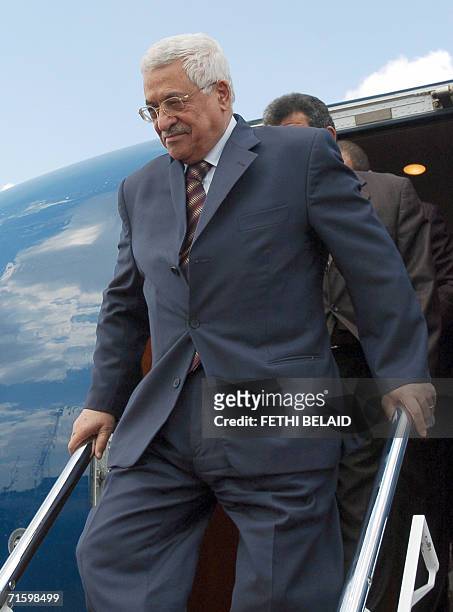 Palestinian leader Mahmud Abbas steps down the gangway upon his arrival at Tunis-Carthage international airport 07 August 2006. Abbas arrived in...