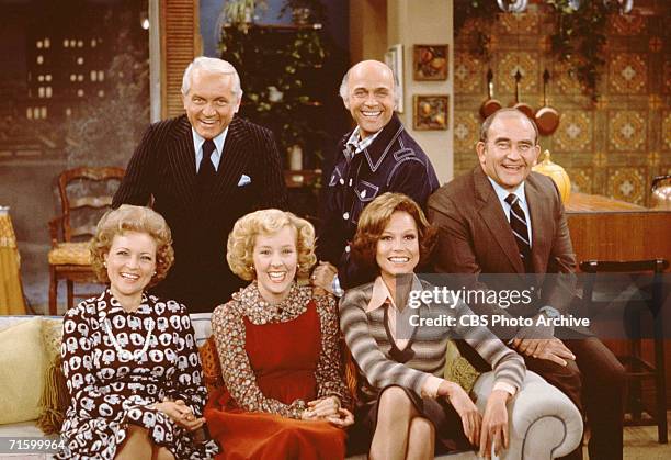 The cast poses on or behind a couch for a publicity portrait on the set of the CBS situation comedy 'Mary Tyler Moore,' Studio City, Los Angeles,...