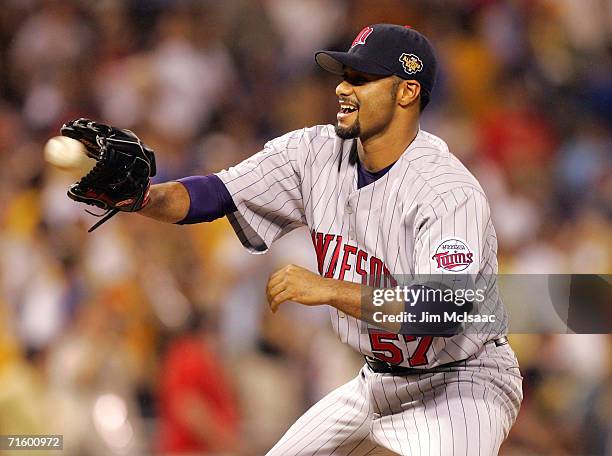 American League All-Star pitcher Johan Santana catches a ball during the 77th MLB All-Star Game against the National League All-Star at PNC Park on...