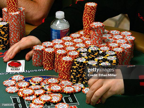 Jamie Gold of California organizes his chips while competing in the World Series of Poker no-limit Texas Hold 'em main event at the Rio Hotel &...