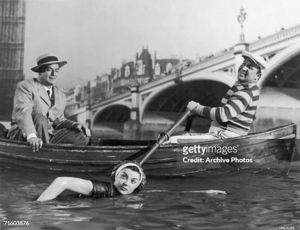 American actors Jesse White , Victor Mature and Esther Williams star in the MGM film 'Million Dollar Mermaid', a biopic of Australian swimmer Annette...