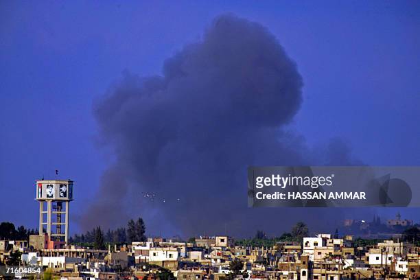 Smoke billows from Burj al-Shemali, three kms east of the southern Lebanese port city of Tyre, following an Israeli air strike 08 August 2006. The...